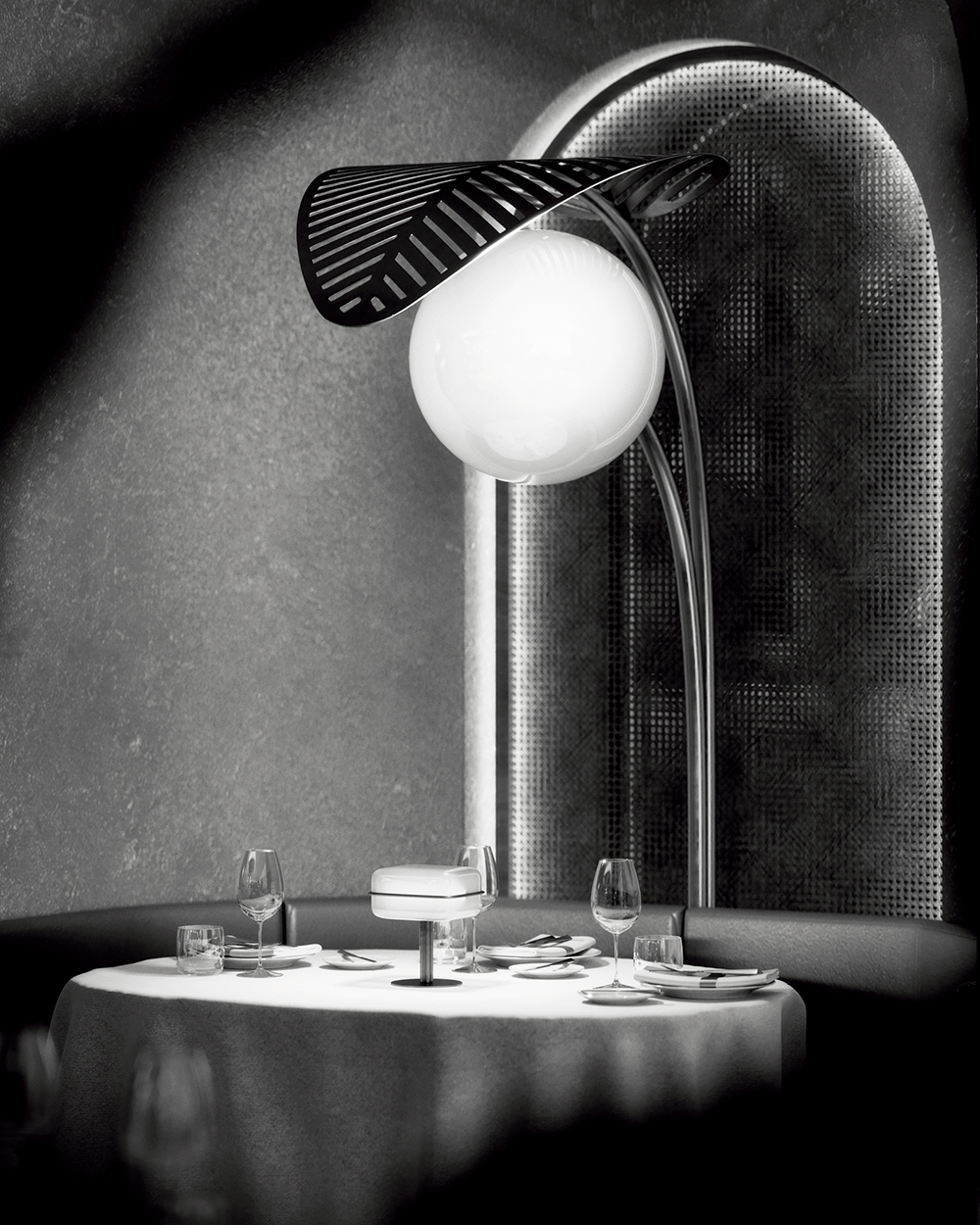 Fancy overhead lamp at a dining table in Privè private dining