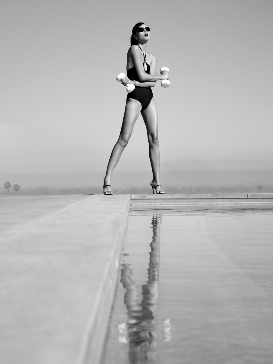 Model in swimsuit at the pool