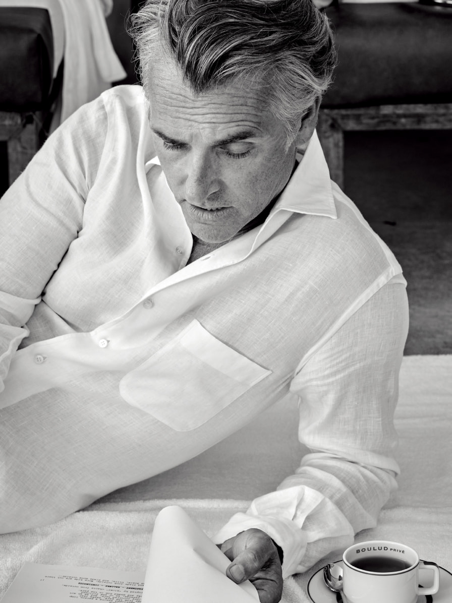 Male model with a white shirt having coffee