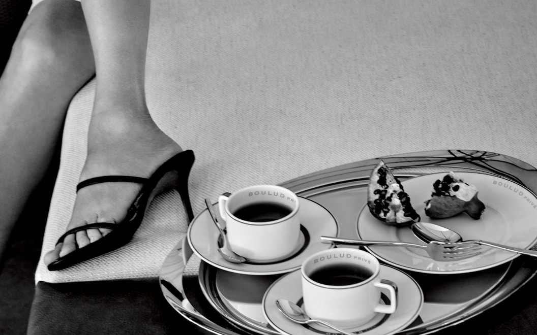 Coffee and dessert setup on a silver platter